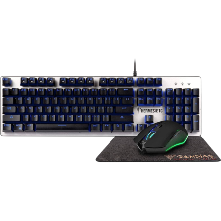 Gaming keyboard with blue backlight and a wired gaming mouse on a textured mouse pad near the edge of a desk.