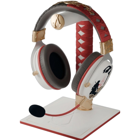 Premium over-ear headset with red braided headband and gold accents on a white display stand, microphone extended to the front.