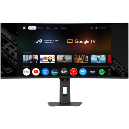 Wide monitor on stand displaying Google TV home screen with app icons like Netflix, YouTube, Disney+, and Spotify (gaming brand branding).